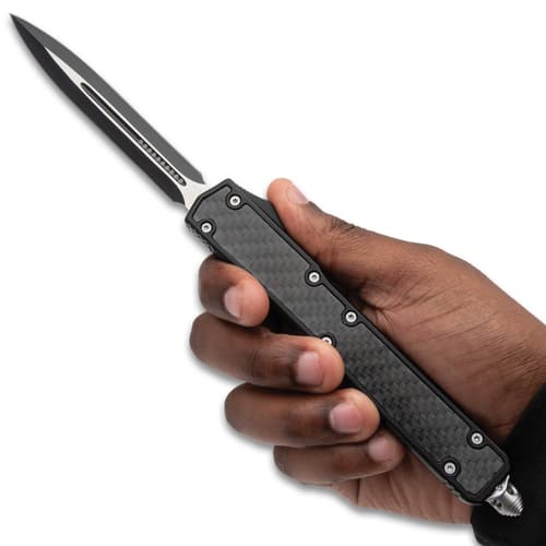 Black OTF Nightpiercer in hand