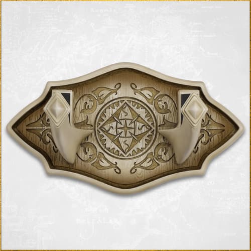Decorative wall mount with intricate design and hooks