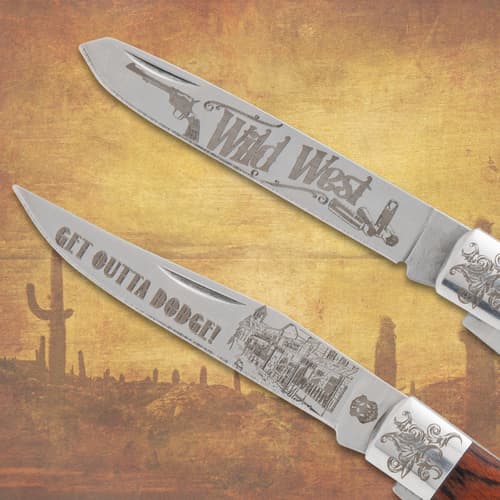 Close-up of knife blades with Wild West engravings