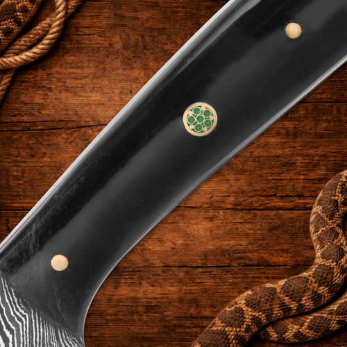 Detailed view of knife handle with decorative pin