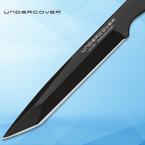 Close-up of black stainless steel knife blade