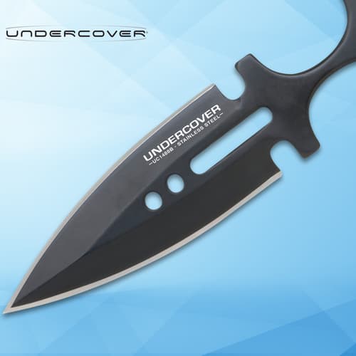 Close-up of black stainless steel push dagger blade