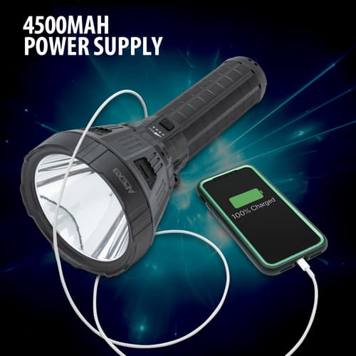 Full image of the LED Spotlight Flashlight charging a cell phone with its 4500 mAh power supply.