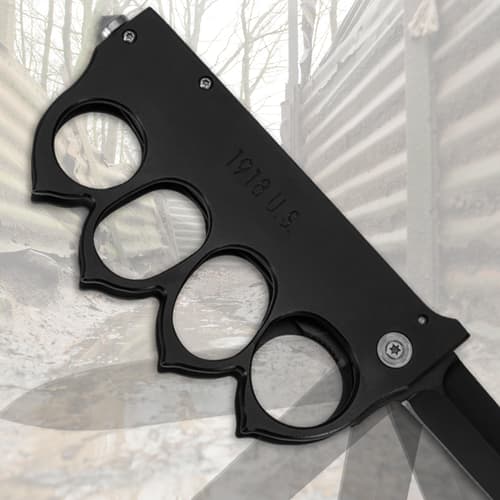Close-up of black knuckle guard handle