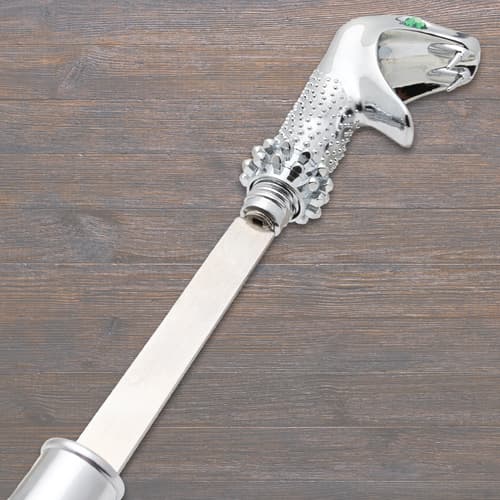 Close-up of sword cane's snake handle and blade