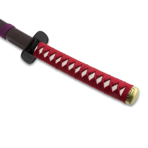 Katana handle with red wrapping and black guard