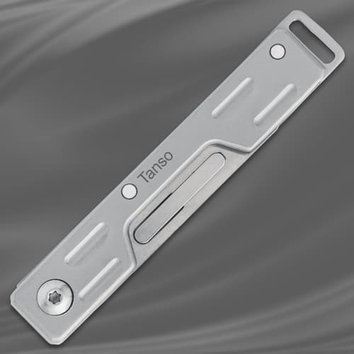 Folded Tanso scalpel knife on a gray background