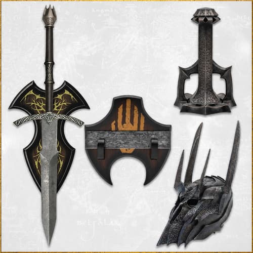 Medieval sword, shield, and helmet with intricate designs on a wooden chest