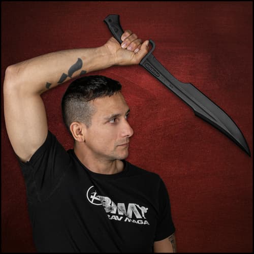 Angled image of the Training Spartan Sword held in hand.