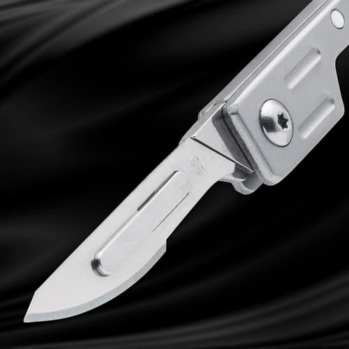 Silver folding knife with partially open blade