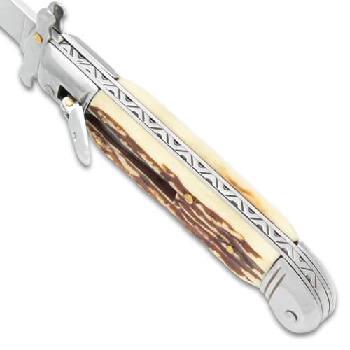 The automatic stiletto knife's fileworked handle spine shown