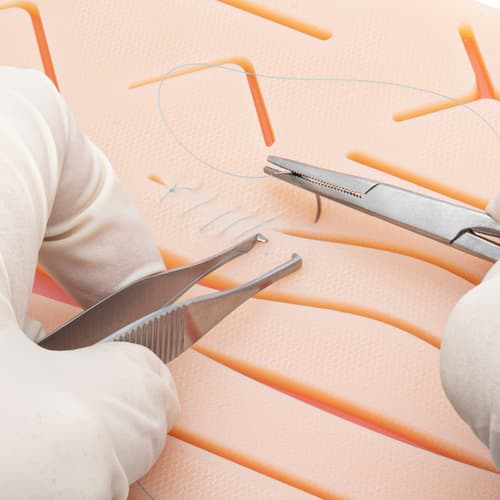 Using the suture kit to practice