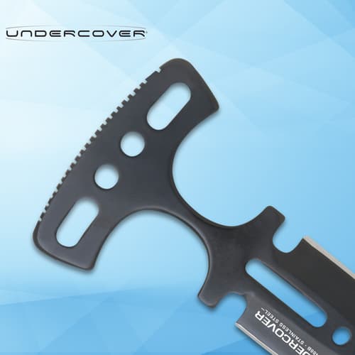 Close-up of black push dagger handle with holes