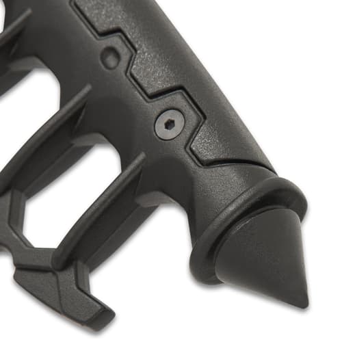 The trench knife handle is of cast metal with black, no-slip rubberized grip inserts and it features a skull crusher pommel