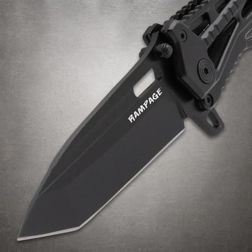 Close-up of black knife blade with Rampage logo
