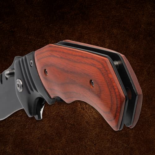 Close-up of wooden handle on a folding knife