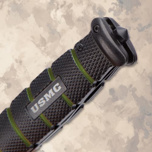Close-up of USMC knife handle with logo