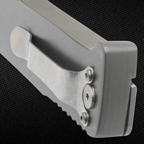Close-up of metal clip on folding knife handle