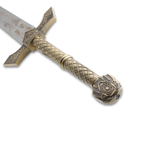 Close-up of sword hilt with detailed engravings