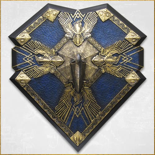 Decorative shield with intricate gold patterns