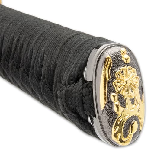 The hardwood handle is wrapped in faux rayskin and black cord and has an intricately detailed metal alloy tsuba