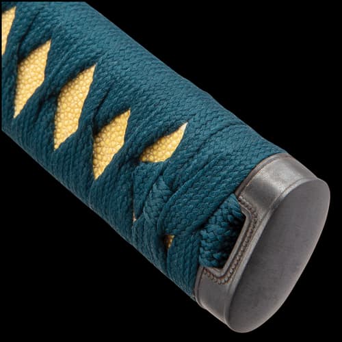 Close view of katana handle with tea dyed rayskin peeking through wrapped in a teal cord