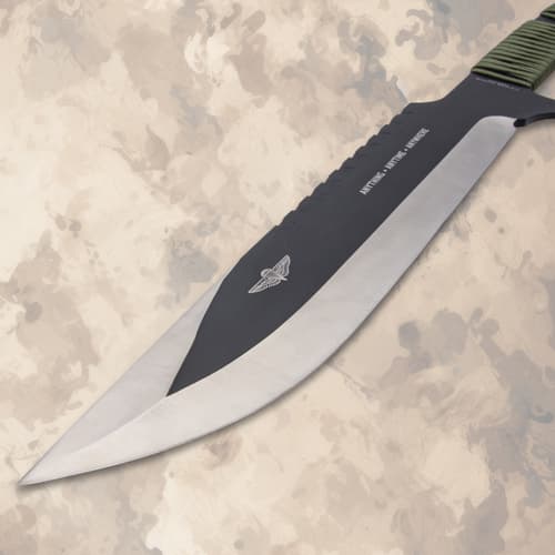 Close-up of knife blade with logo