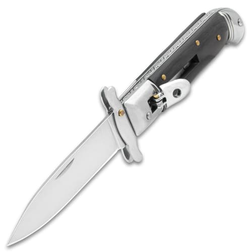 The automatic stiletto knife shown with the blade prominently displayed