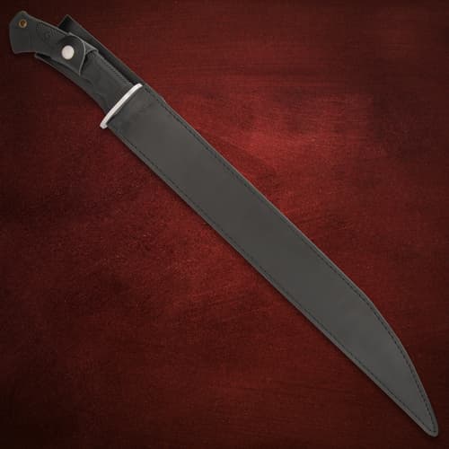Black leather sheath for Honshu D2 knife on red background