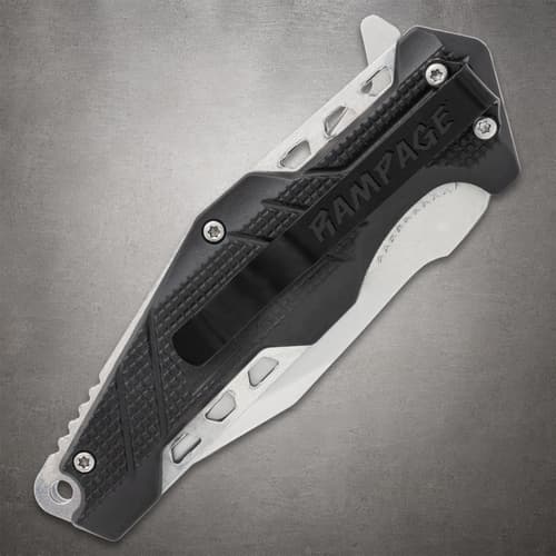 Folding knife with a black handle and metal clip