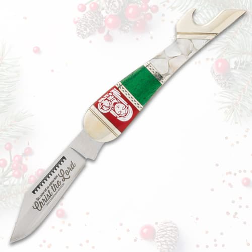 Full view of Christmas-themed knife with engraved blade