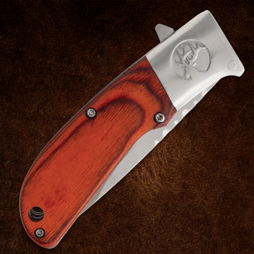 Folded Timber Wolf pocket knife with wood handle