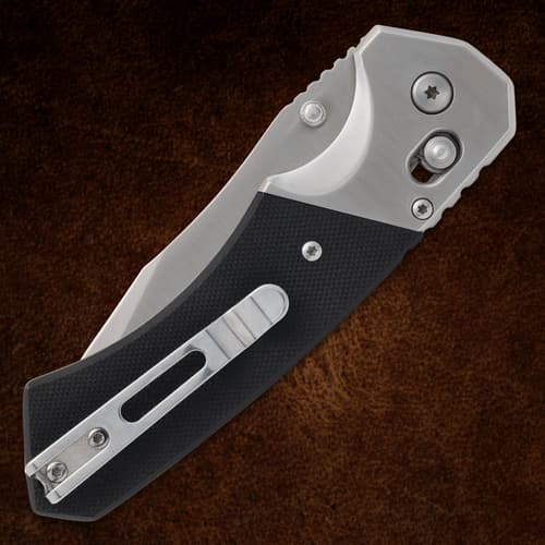 Close-up of silver blade on a folding knife