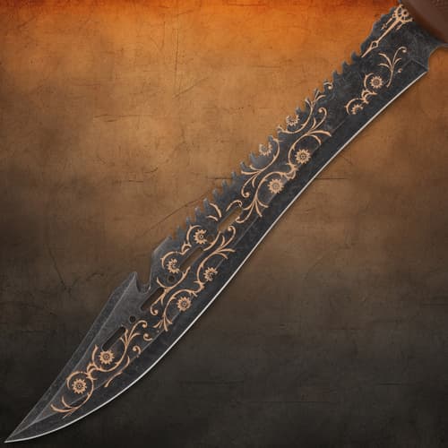 Detailed view of machete blade with floral engravings