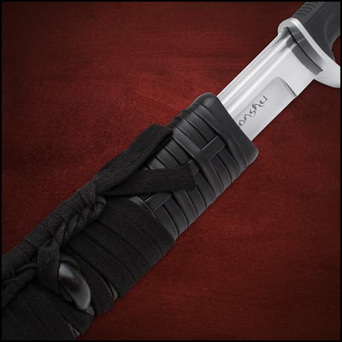 Japanese sword with high carbon steel blade extended from a carbon steel handguard engraved with Honshu