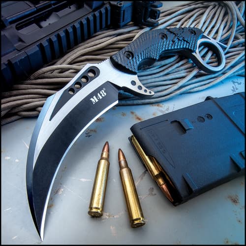 Karambit knife with bullets and tactical gear