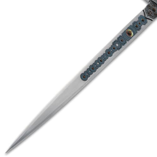 Close-up of sword blade with decorative patterns