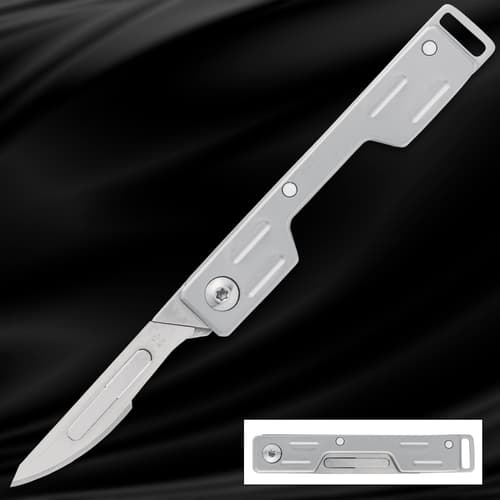 Silver folding knife with open blade on black background