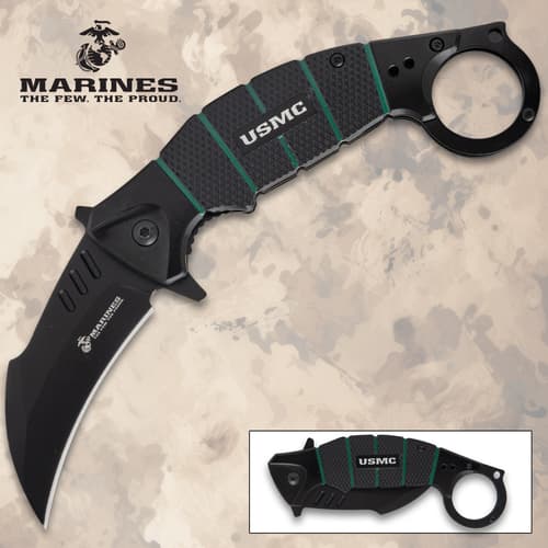 Black USMC karambit knife with curved blade