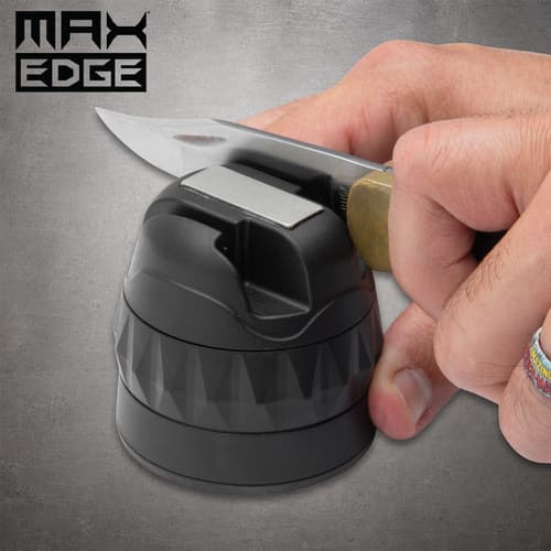 Hand sharpening a pocket knife with the black Max Edge three-stage knife sharpener