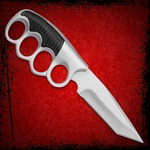 Knife with knuckle grip on red background