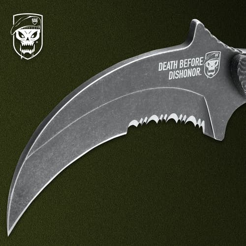 Close-up of serrated knife blade on green background
