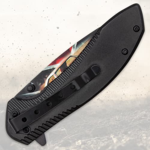 Closed folding knife with black handle and clip