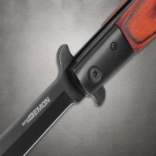 Close-up of Ridge Runner Speed Demon knife showing transition between blade and wooden handle