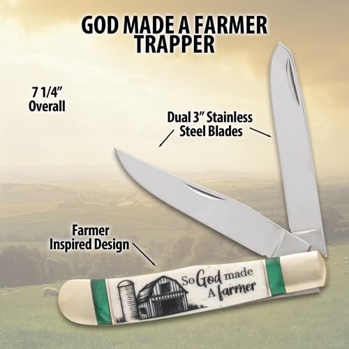 Pocket knife with dual blades, labeled 'God Made a Farmer Trapper'
