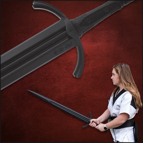 Person holding a black training sword, close-up of hilt
