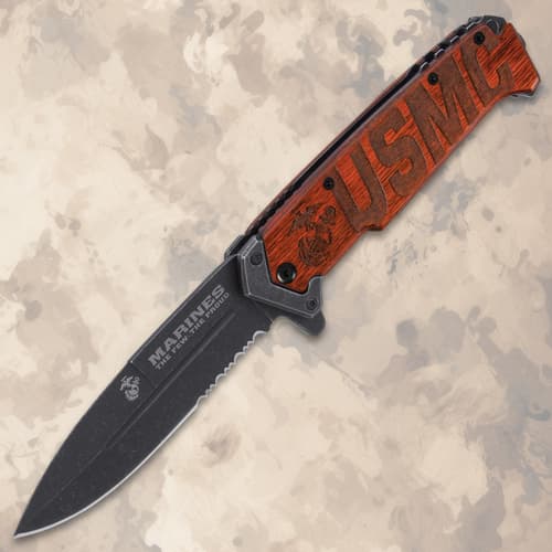Open folding knife with USMC engraved handle