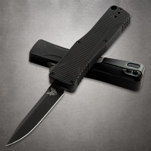 Black knife with open blade and closed handle
