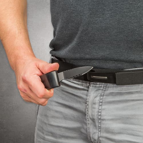 Person holding hidden knife from black belt