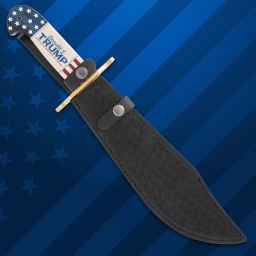 Knife in black embossed leather sheath on blue background